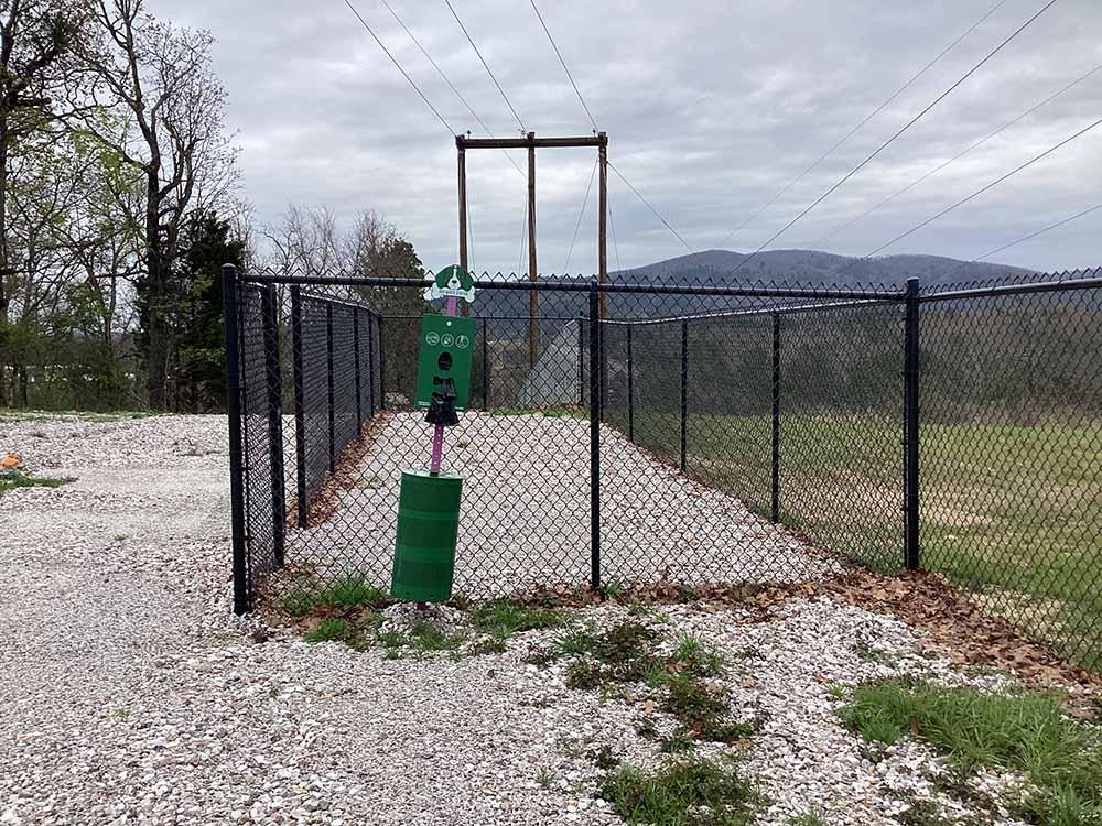 The fenced in dog park at HOT ROD HILL RV PARK