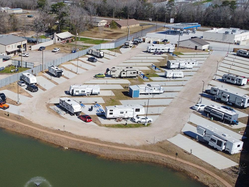 Aerial view of RVs parked in sites at NEW CANEY RV PARK