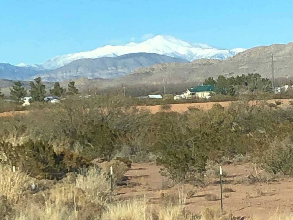 View of snowcapped mountains at Mountain Meadows RV Park