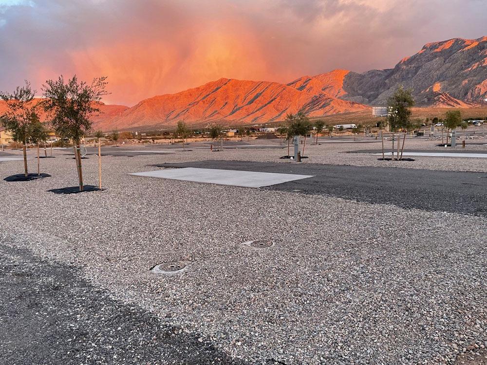 The paved RV sites under the sunset at DESERT SPRINGS RV RESORT