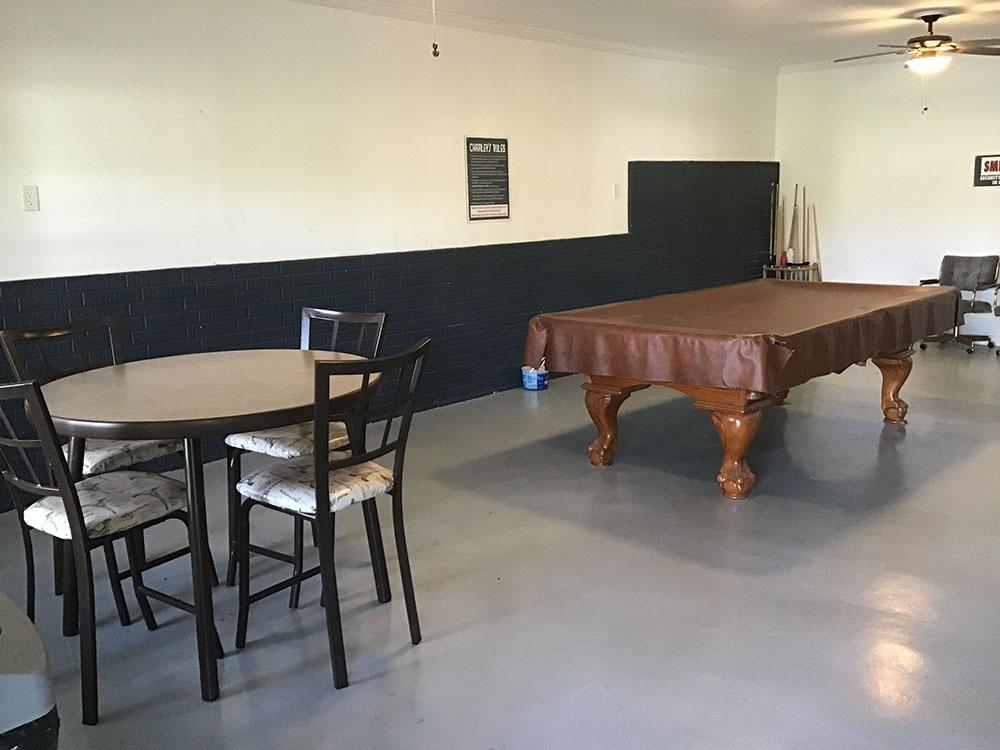A covered pool table at LA COSTA MOBILE HOME & RV PARK