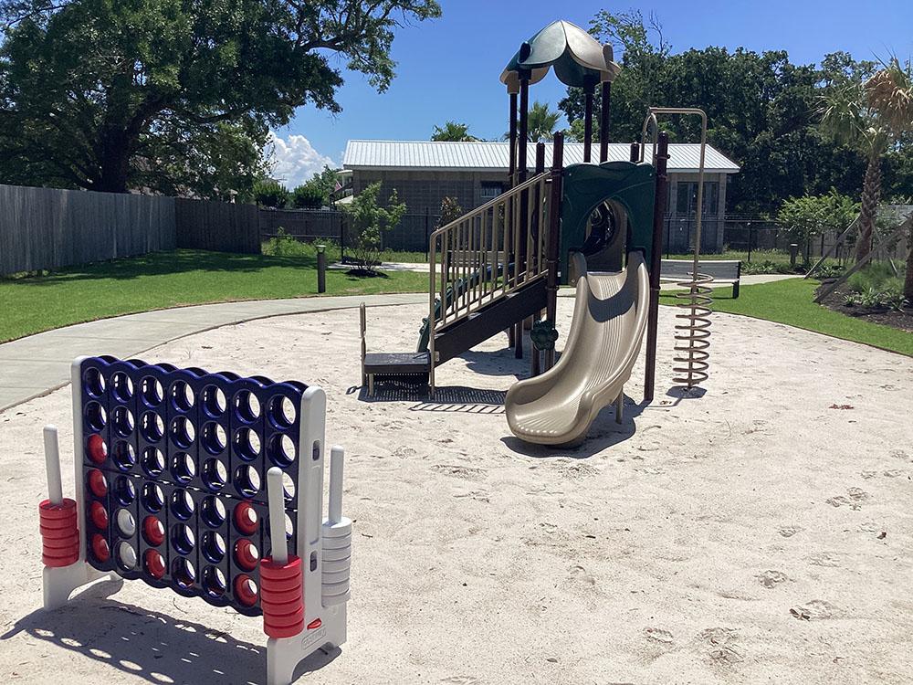 Playground with games at GULFPORT LUXURY RV RESORT