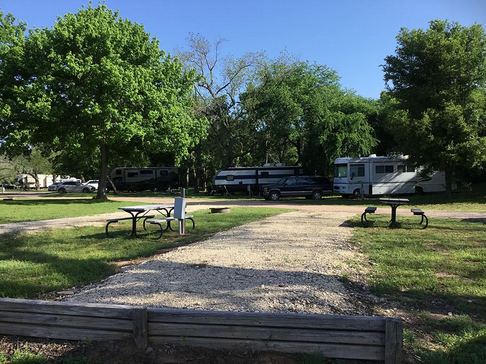 One of the gravel RV sites at BRAZOS RIVER HIDEOUT