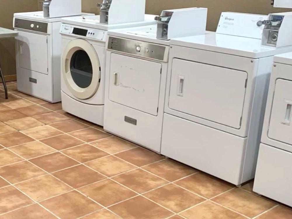 Interior of the laundry room at BROKEN SPOKE RV