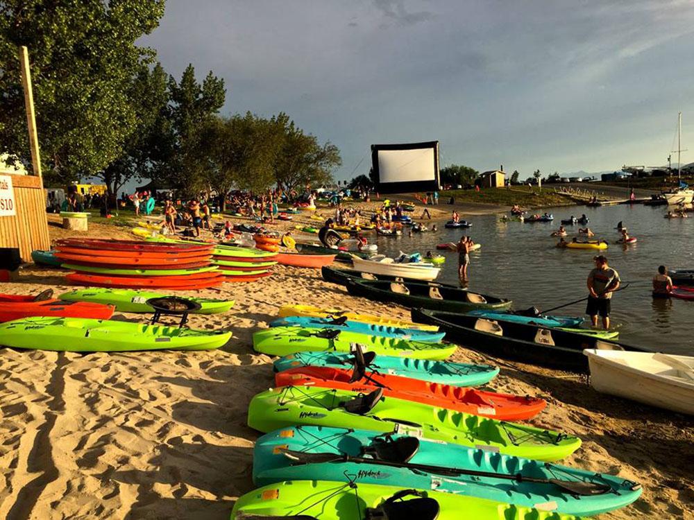 Kayaks on the shore at LAKE SHORE RV PARK