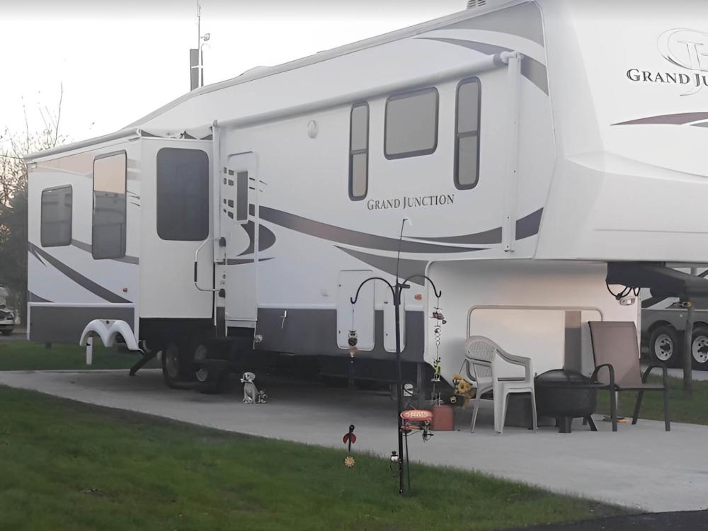 Parked trailer at site Gallagher Acres RV Park