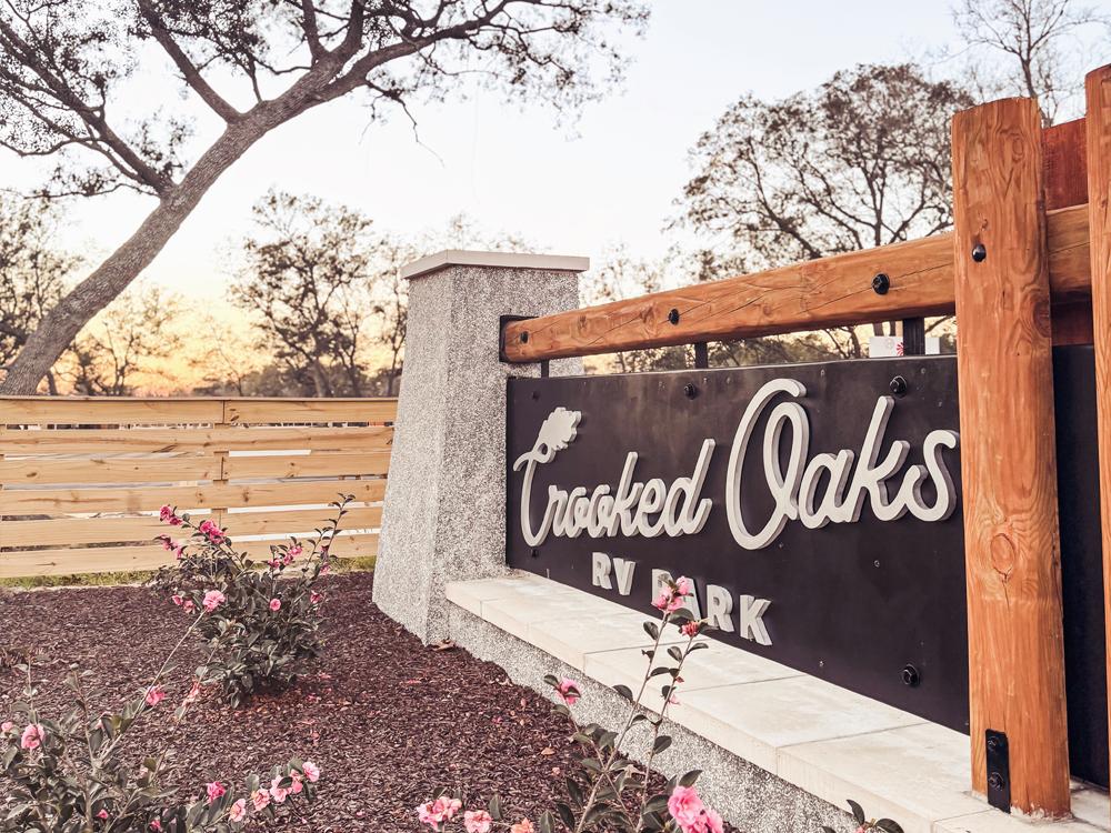 The front entrance sign at CROOKED OAKS RV PARK