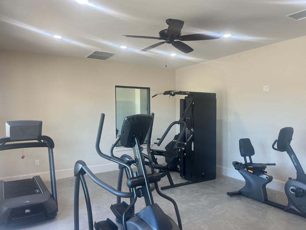 Workout equipment in the fitness center at WILLIS HILLSIDE RV RESORT