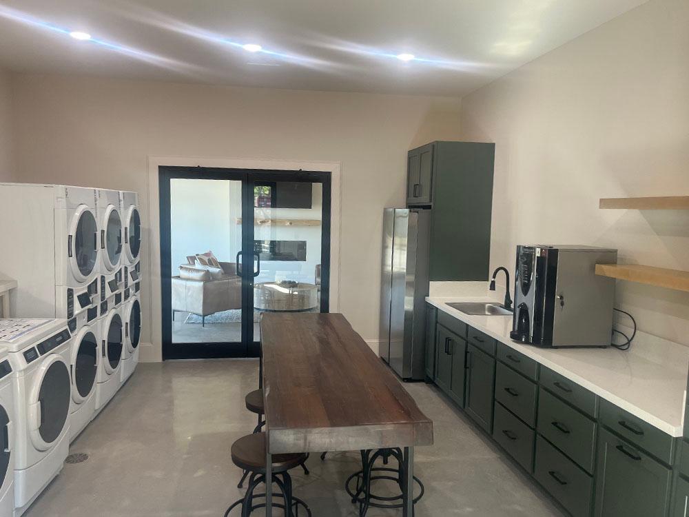 Large laundry room with kitchen area at WILLIS HILLSIDE RV RESORT