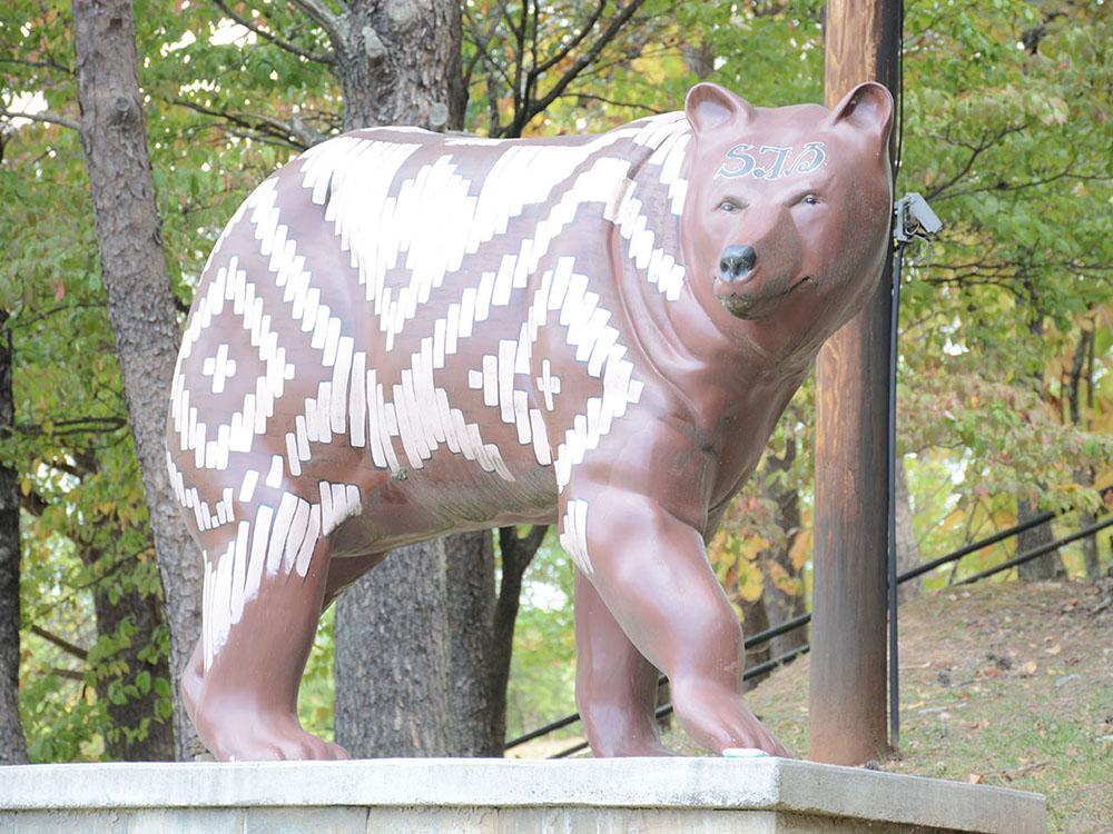 Statue of a bear at SWEETWATER SIGHTS RV PARK & CABIN RENTALS