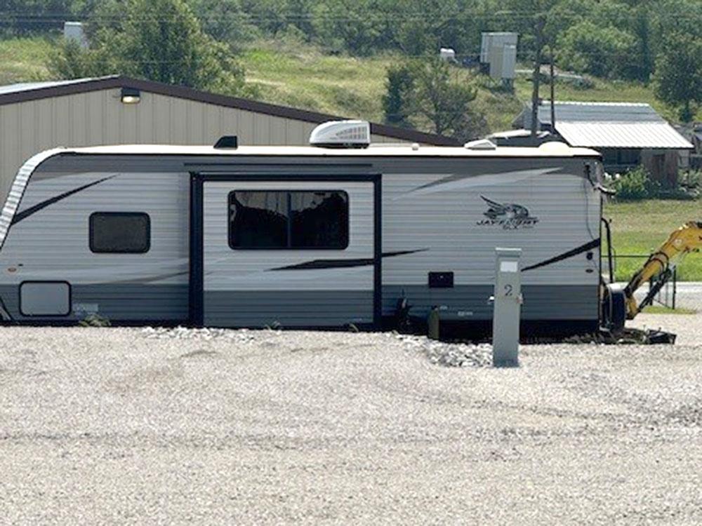 Large RV at site at C&W RV PARK