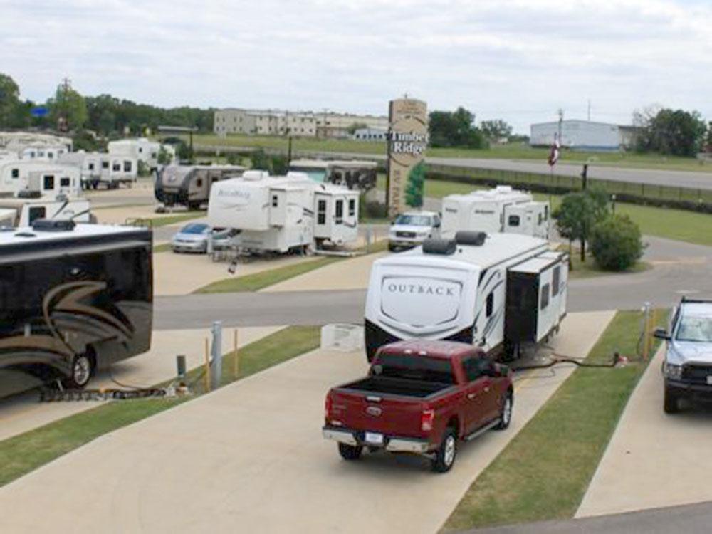 A view of RVs parked in sites at TIMBER RIDGE RV PARK