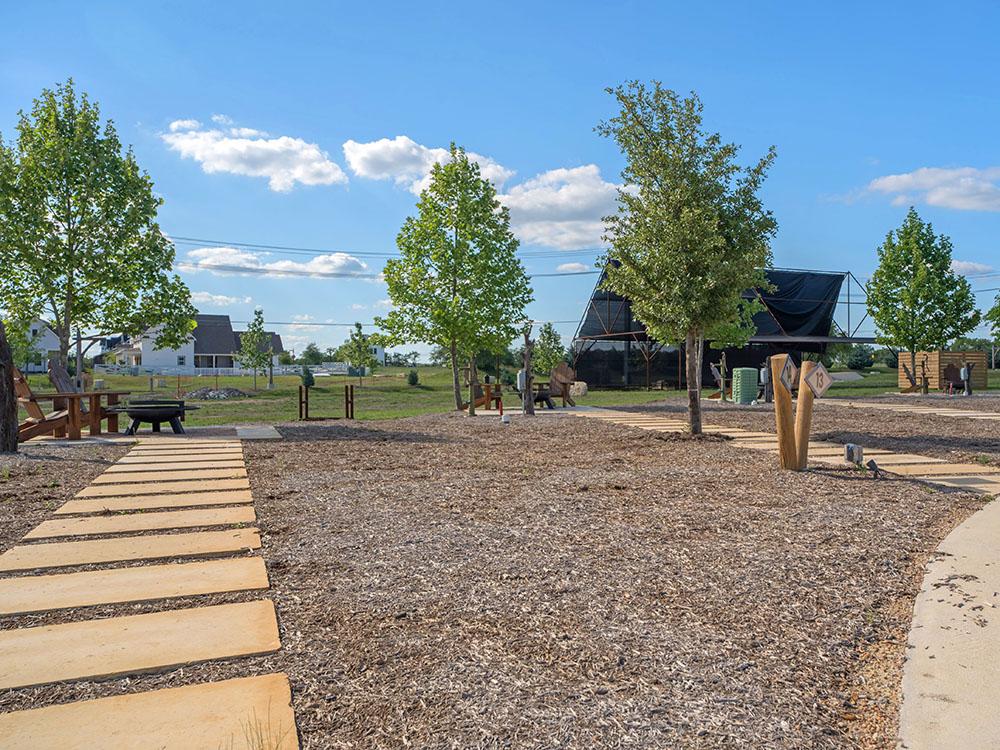 RV site and trees at STARDUST AIRSTREAM RV RESORT AT CEDAR BREAK LODGING