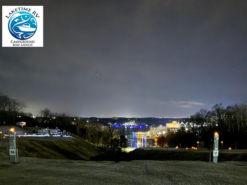 RV sites and the barn at night at LAKETIME RV CAMPGROUND