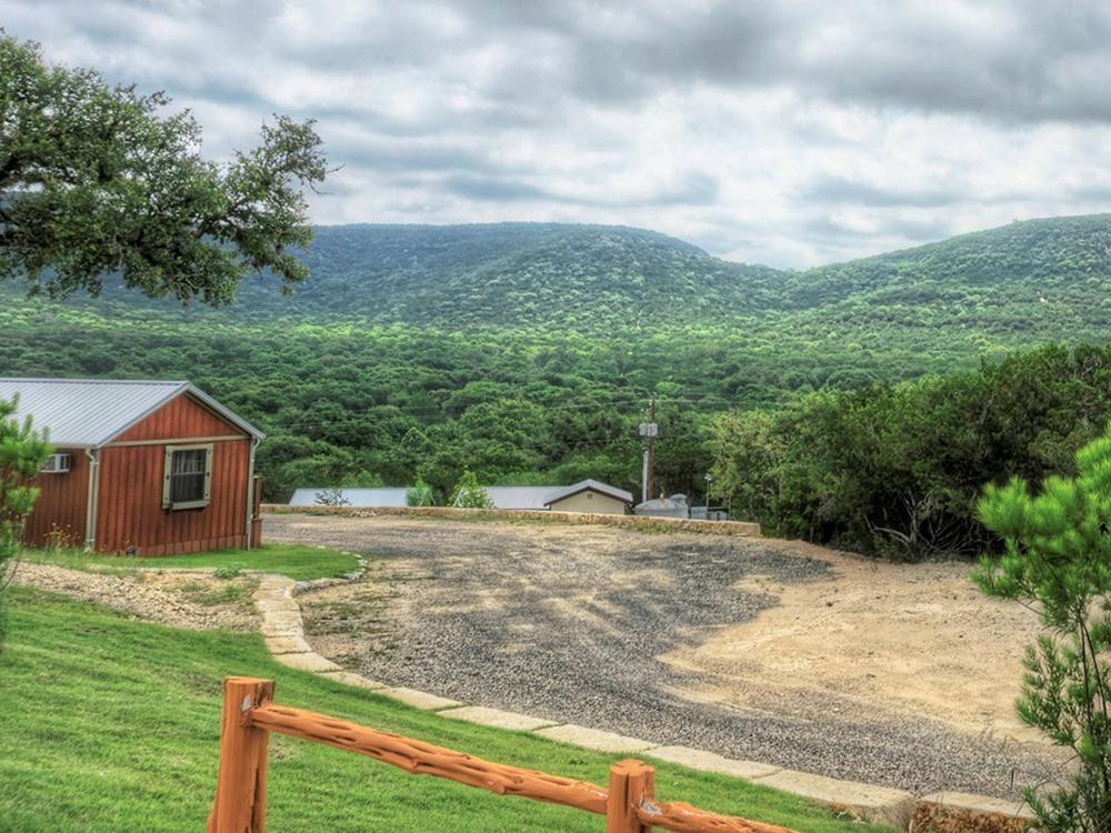 View of green hills in the distance at LOST MAPLES RV AND CAMPING