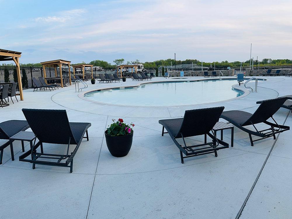 Seating around the pool at SANDUSKY RV RESORT