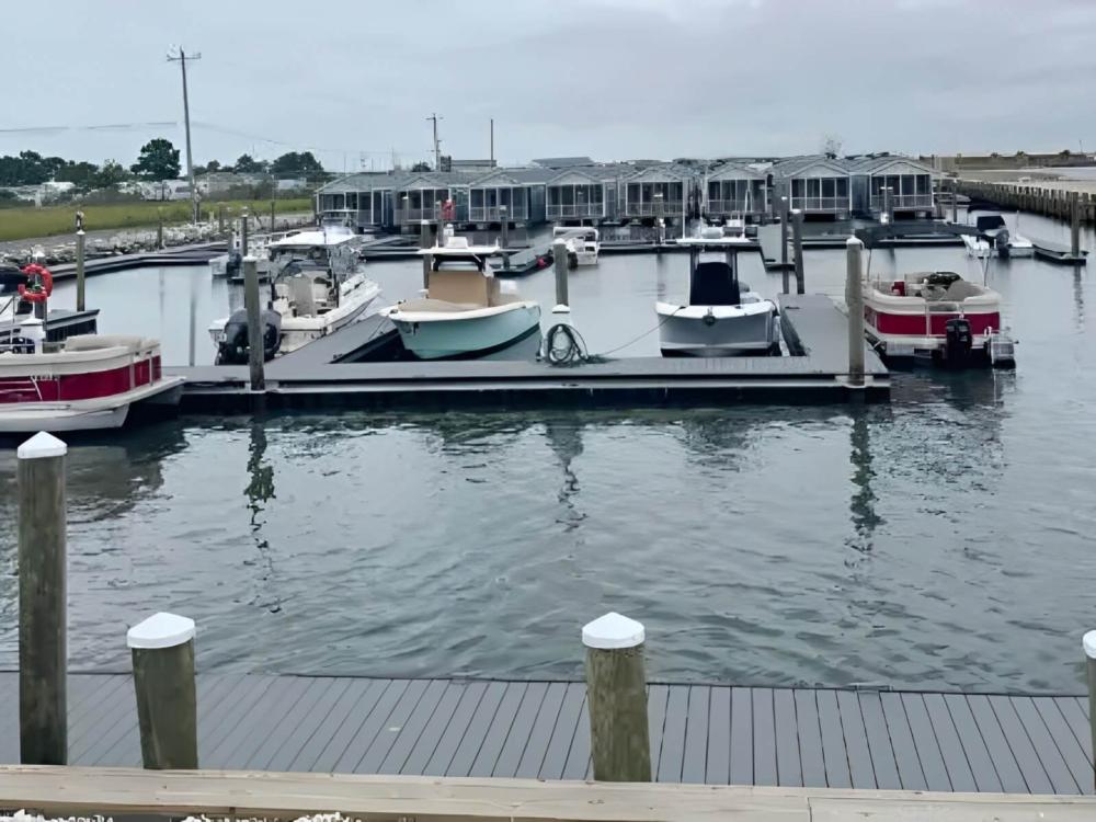 Boats docked at site BluFin Bungalows & Marina