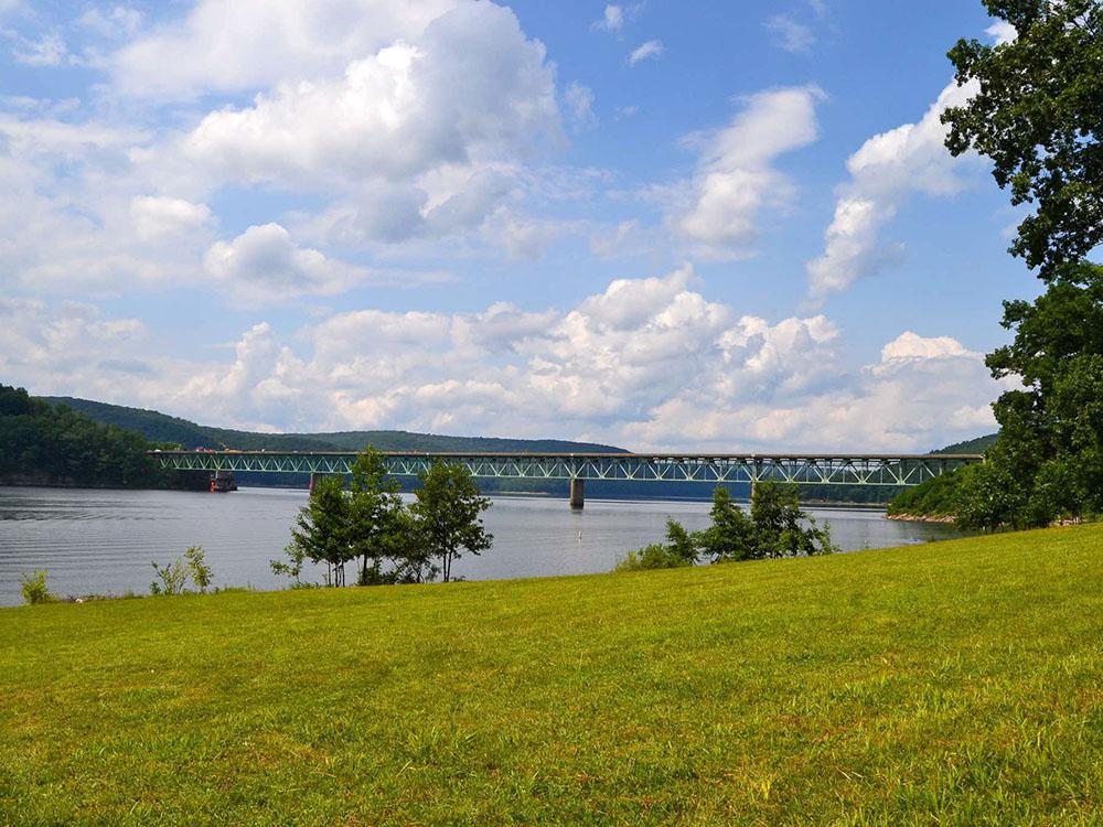 Grassy area next to the water at KINZUA EAST KAMPGROUND