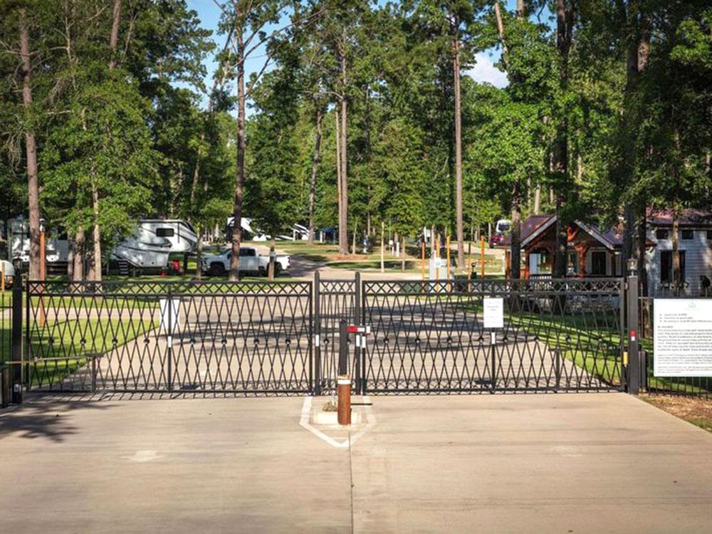 The secure entry gate at WOODLAND CREEK RV PARK