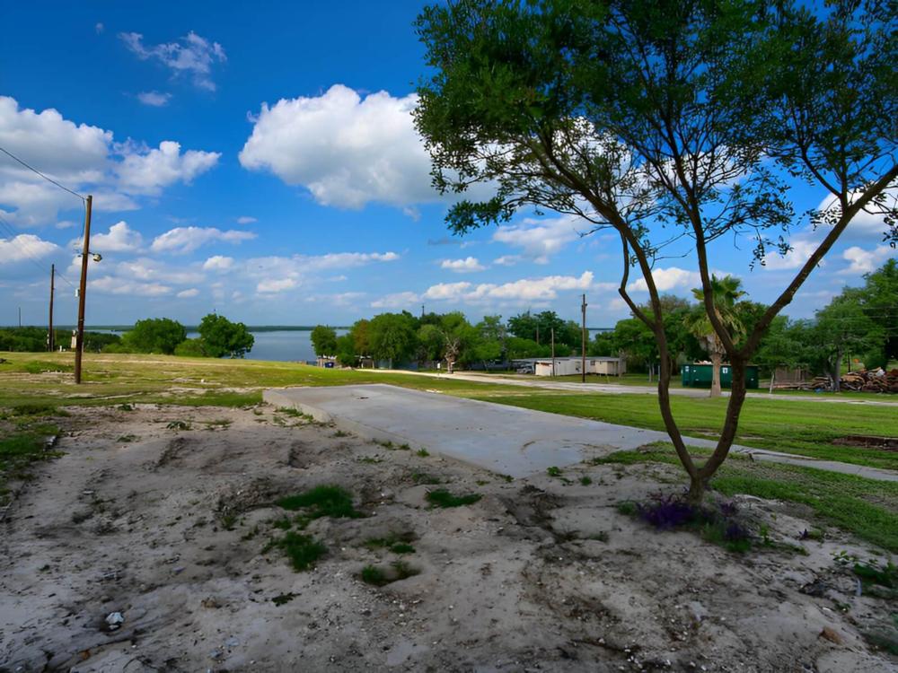 Open paved RV space at site Lake Corpus Christi RV Resort