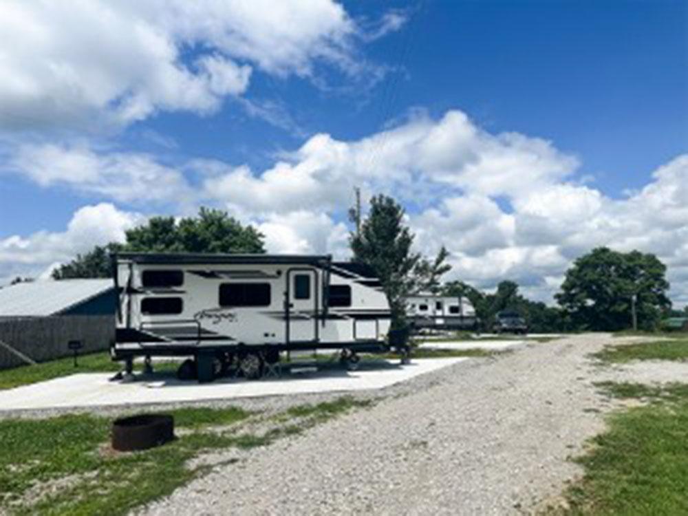 Trailer in a site at FRANK'S AT CANE HOLLOW RV PARK