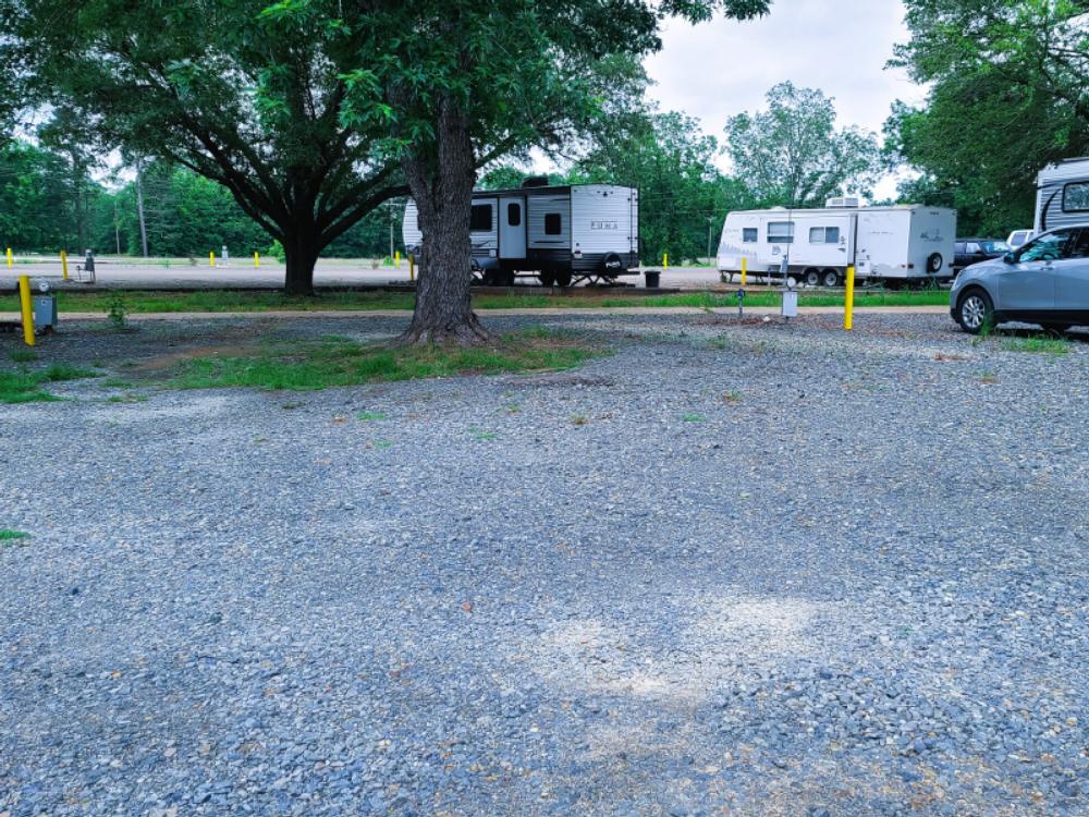 Various travel trailers parked at sites at Lost Lake RV Park