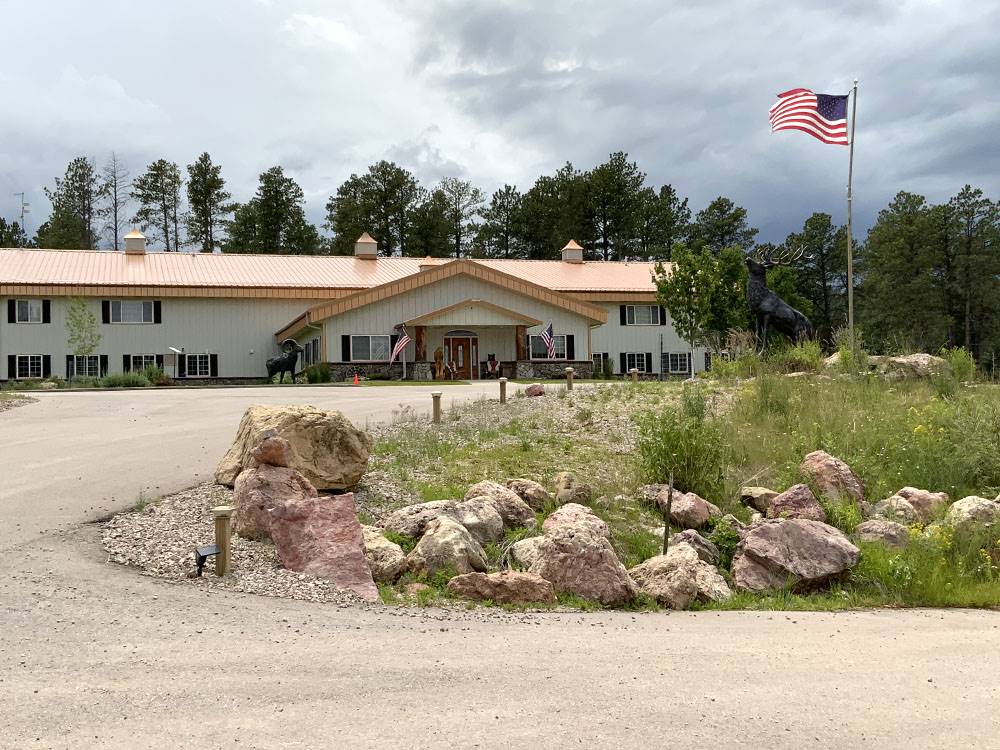 View of the office building from the road at CanAmerican 85 RV Park