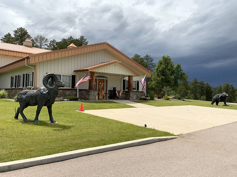 Bear and Ram statues in front of the office at CanAmerican 85 RV Park