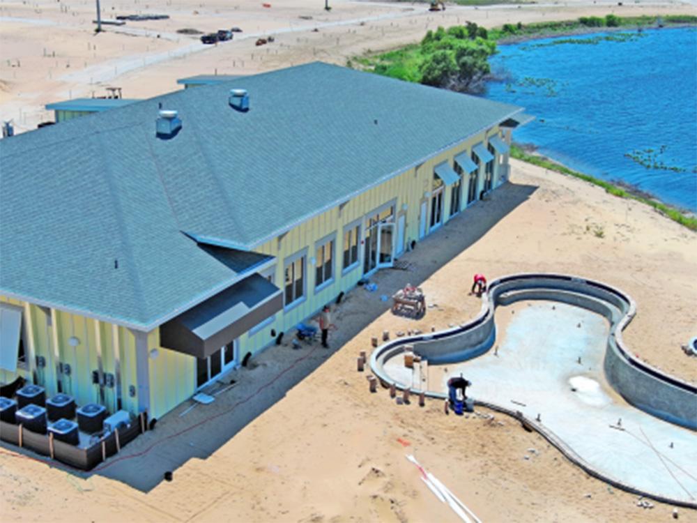 Exterior building and pool construction at WATERSIDE RV RESORT