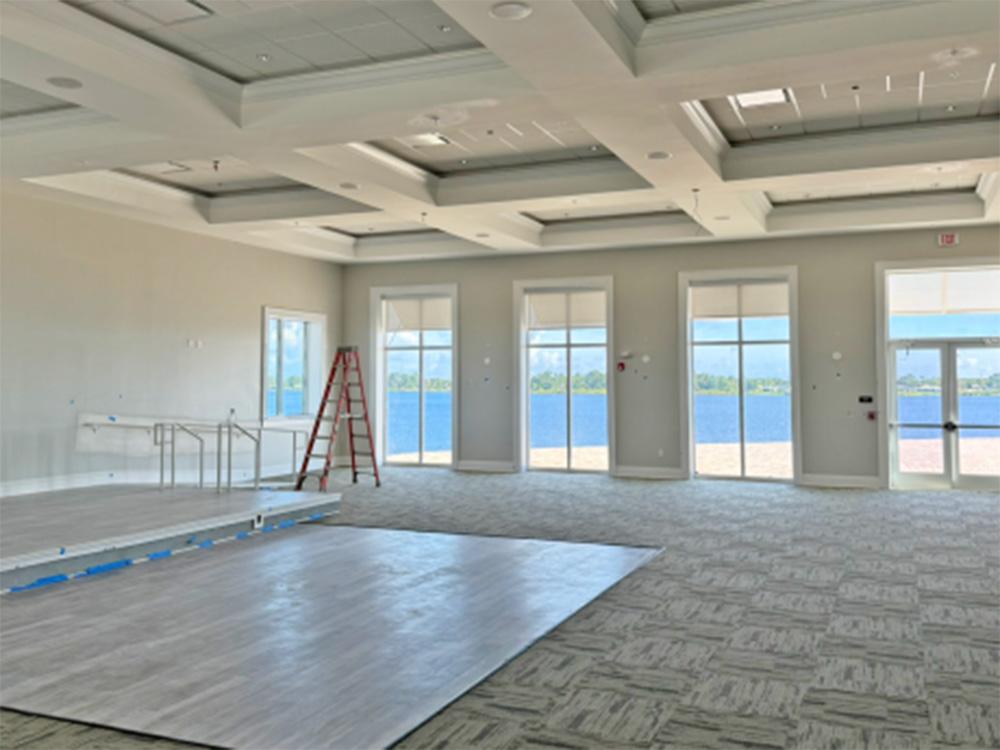 Interior of building with large windows at WATERSIDE RV RESORT