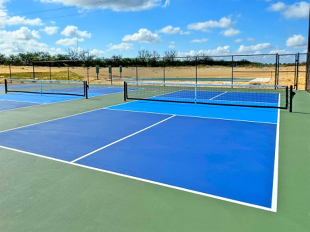 Tennis courts on grounds at WATERSIDE RV RESORT