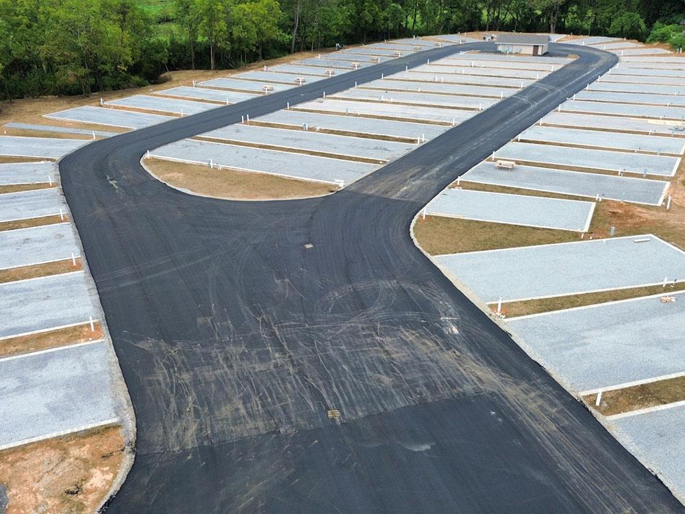 Paved road through sites at OLD FORT RV PARK