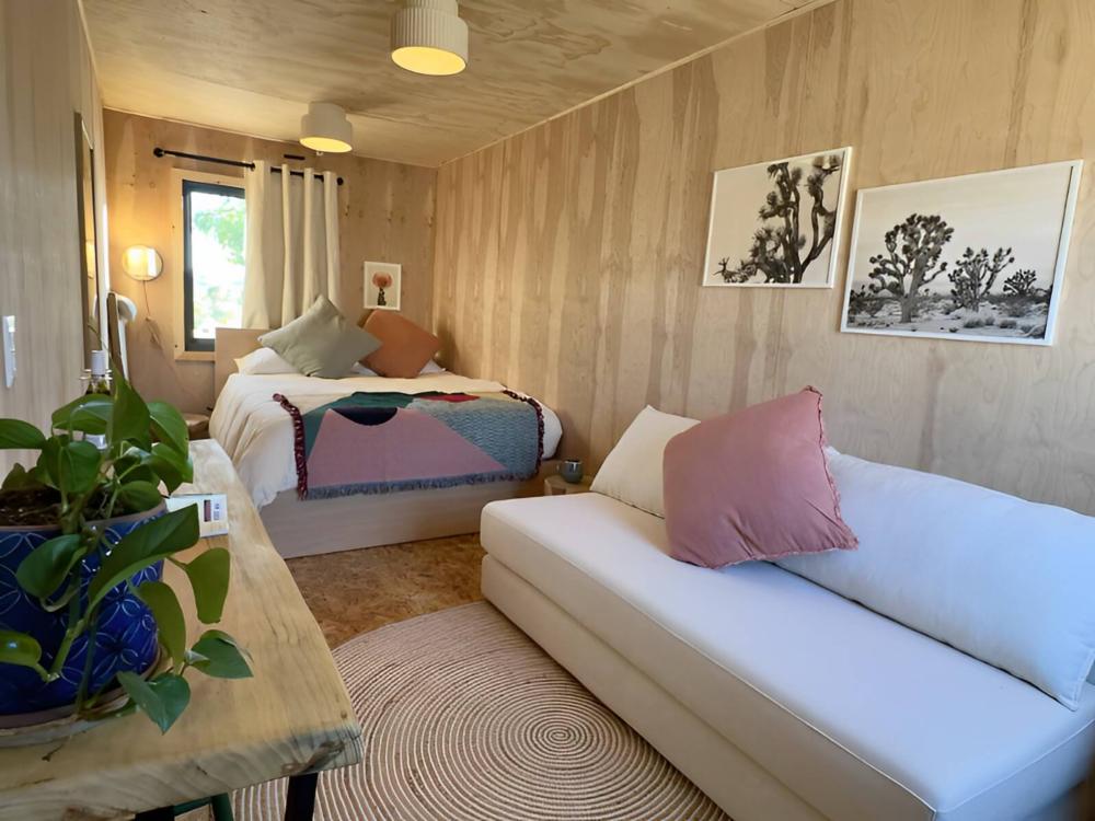 Living area of cabin at site Hostel Cubed at Joshua Tree Lake
