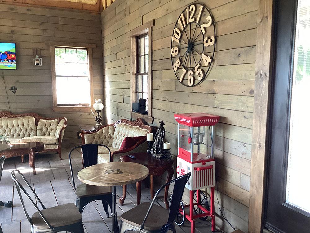 Sitting area with popcorn maker at JESSIE JAMES JUNCTION RV PARK