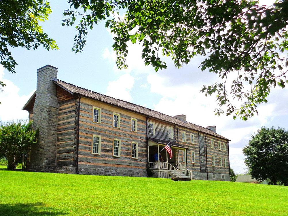 View of older home at ROCK WALL RV PARK