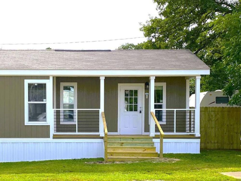 Exterior of a tiny home at PINE RIDGE RV PARK