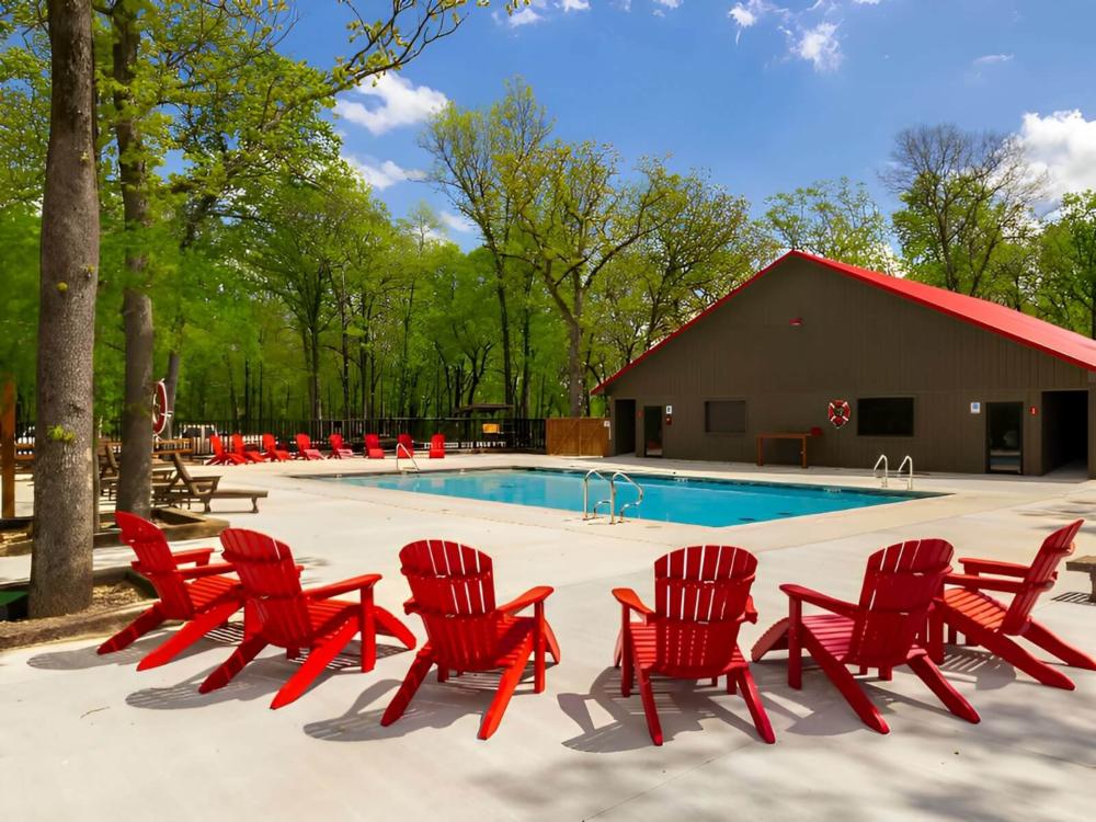 Pool with red chairs at site Marina Del Rey Resort