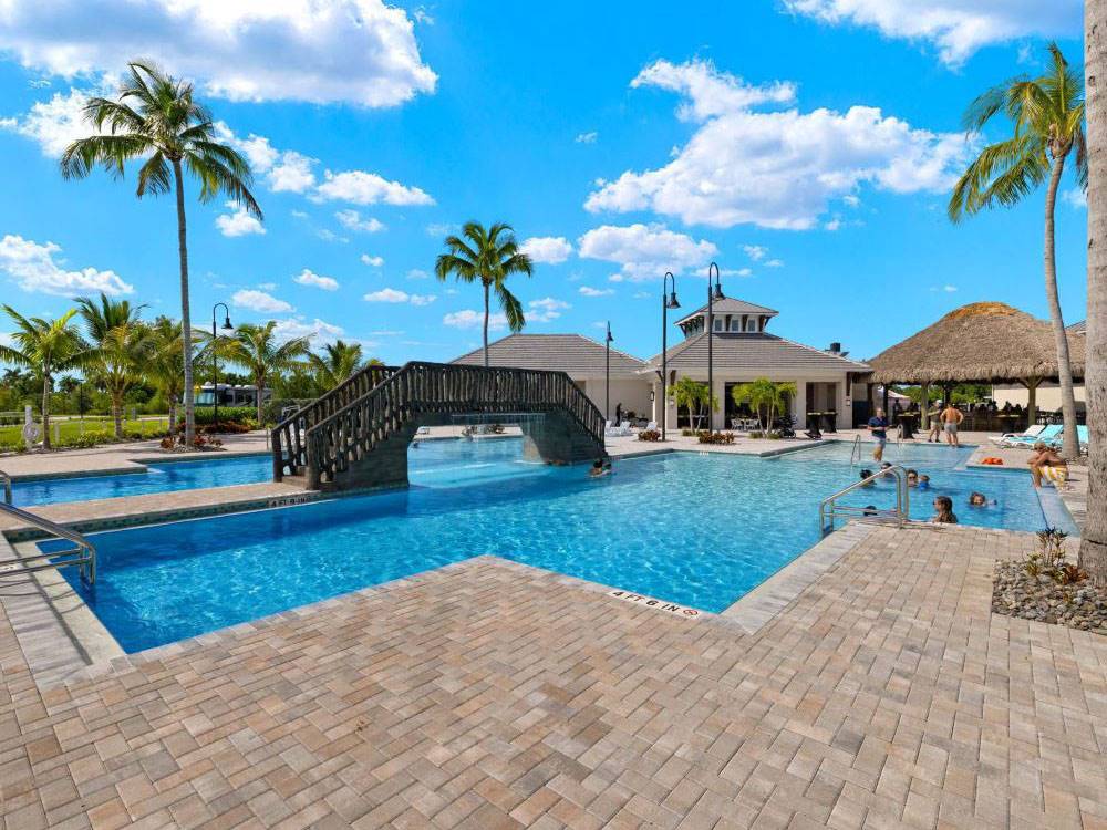 Pool with walking bridge at Laguna Caribe