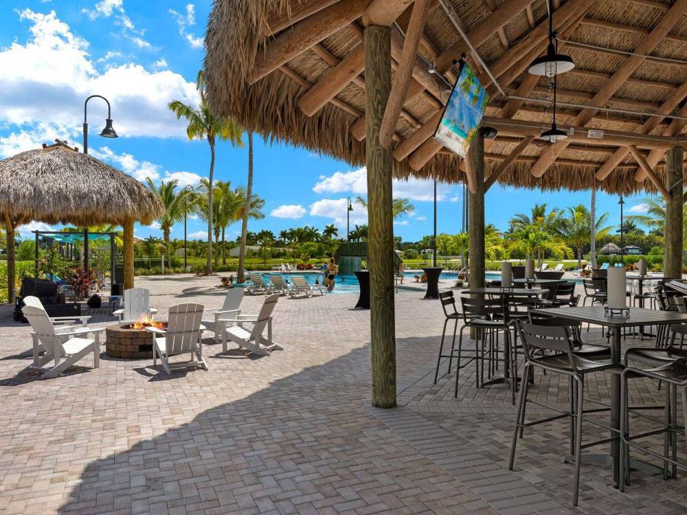 Covered pool area and fire pit at Laguna Caribe