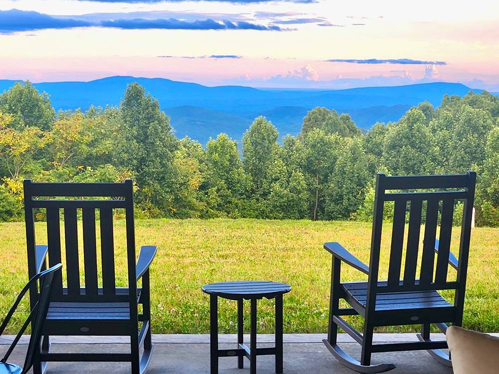 Chairs overlooking the park at The Oaks RV Resort