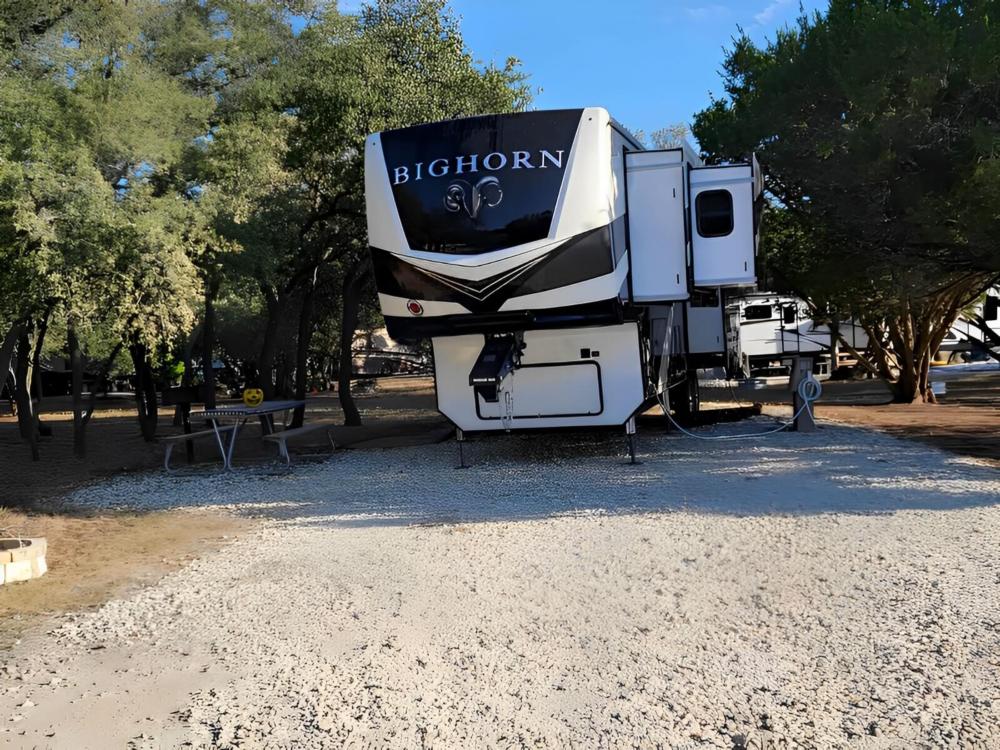 Parked trailer at site Terraqueous RV Resort