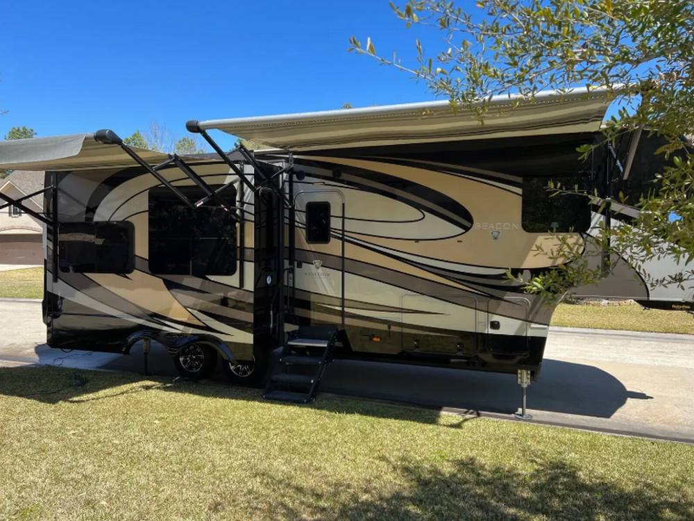 Brown trailer at Serenity Ponds RV Resort