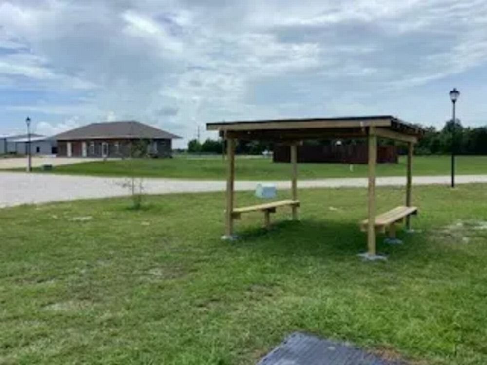 Covered sitting area Serenity Ponds RV Resort