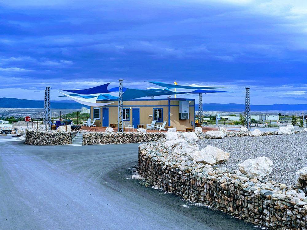 Large blue shade sails over an office at COTTONWOOD SPRINGS RV RESORT