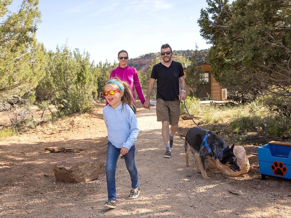 Happy child in front of family at BEST FRIENDS RV PARK