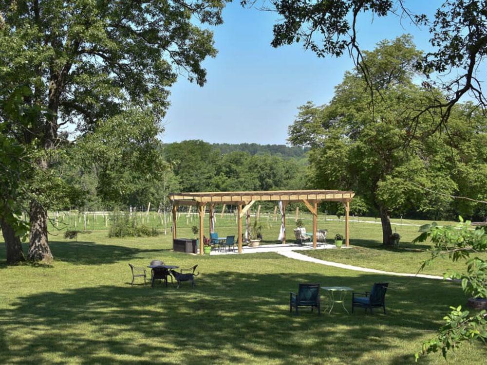 Covered seating area at HOPEWELL BRIDGE WINERY & RV PARK