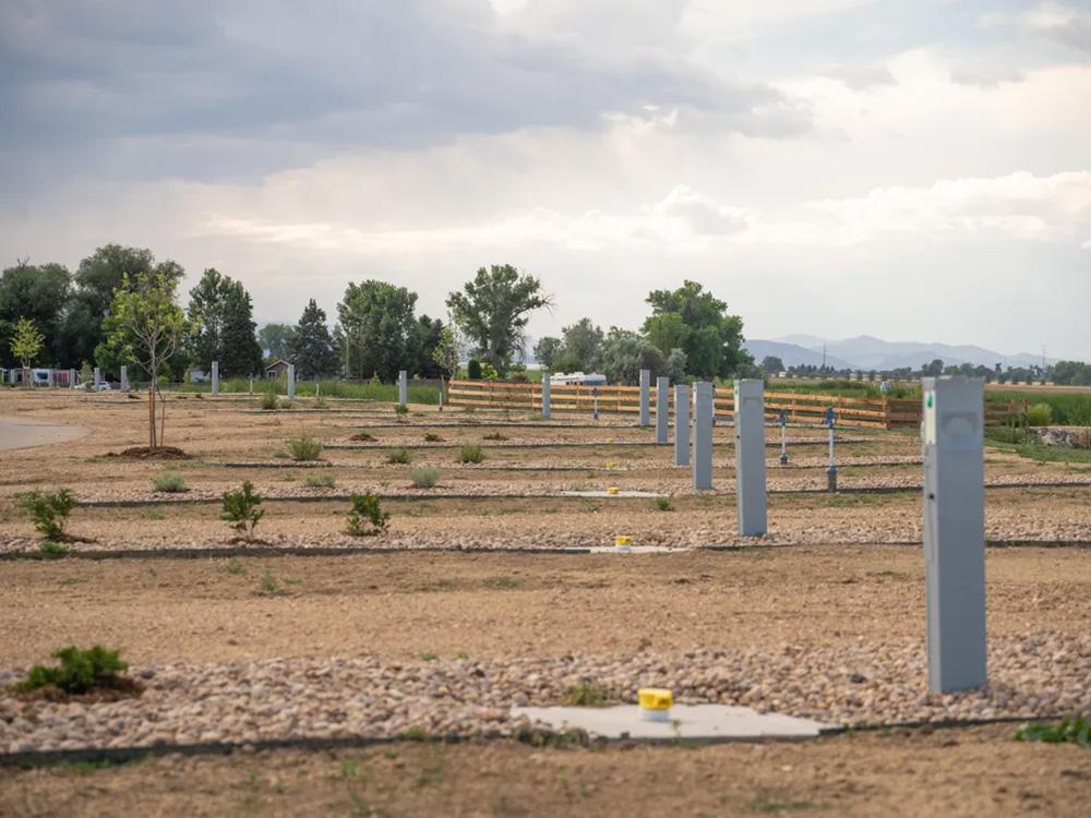 Row of gravel RV spaces at GOPHER GULCH RV & CAMPGROUND