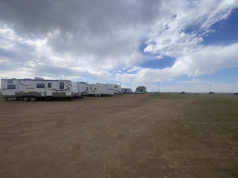 Travel trailers parked at sites at Mosquero RV and Stalls