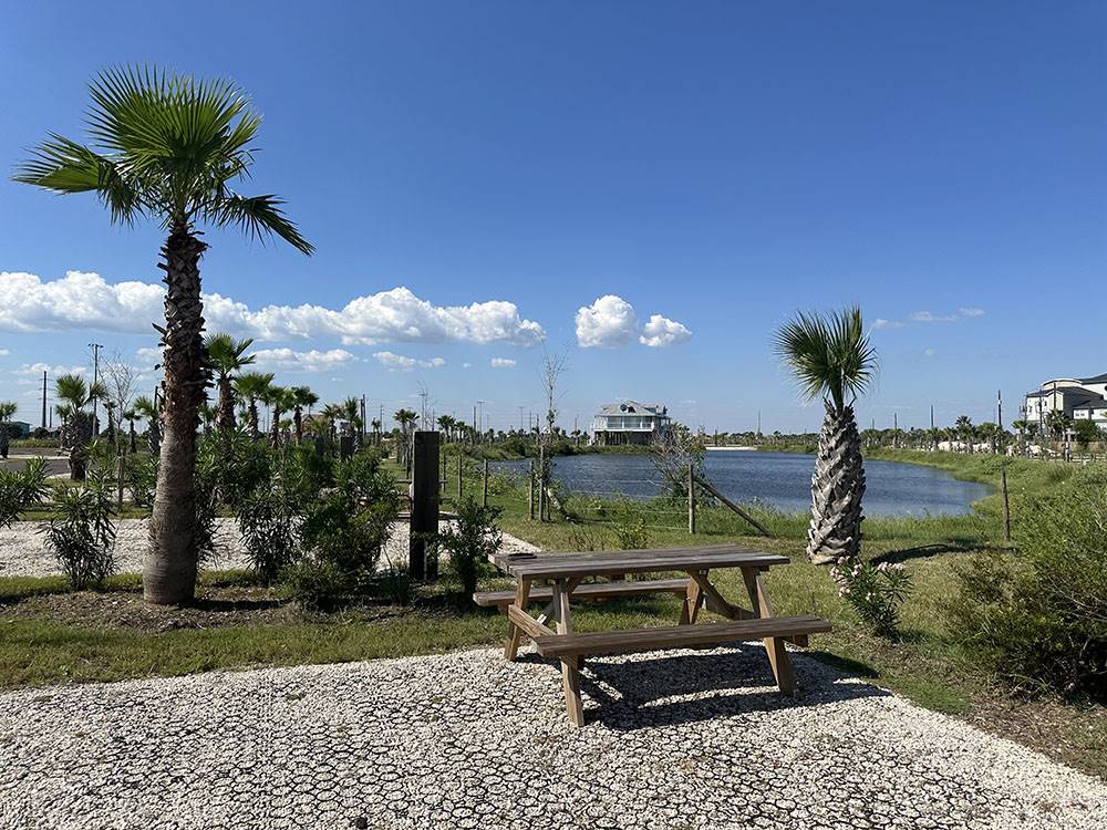 Gravel sites near the pond at Galveston Island RV Park