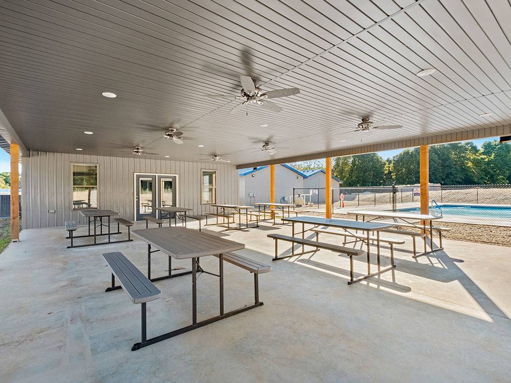 Covered outdoor seating area at Blue Springs RV Park